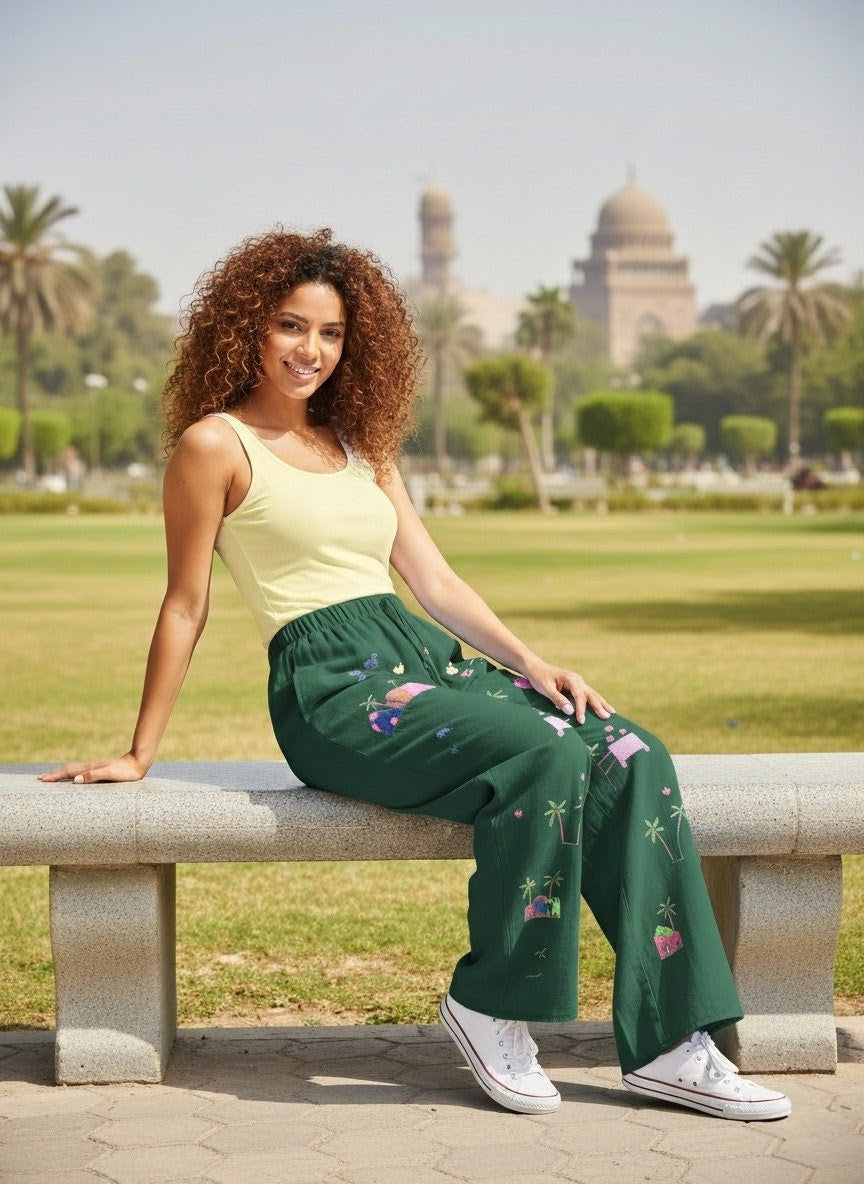 Woman sitting on a bench in a park with a scenic background