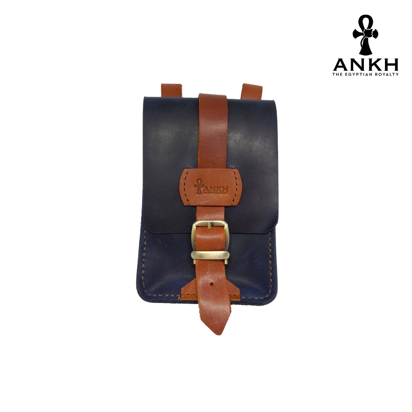 A genuine leather cross bag in dark blue with brown straps and handcrafted brass accessories, displayed on a white background with a black logo of ANKH - The Egyptian Royalty.