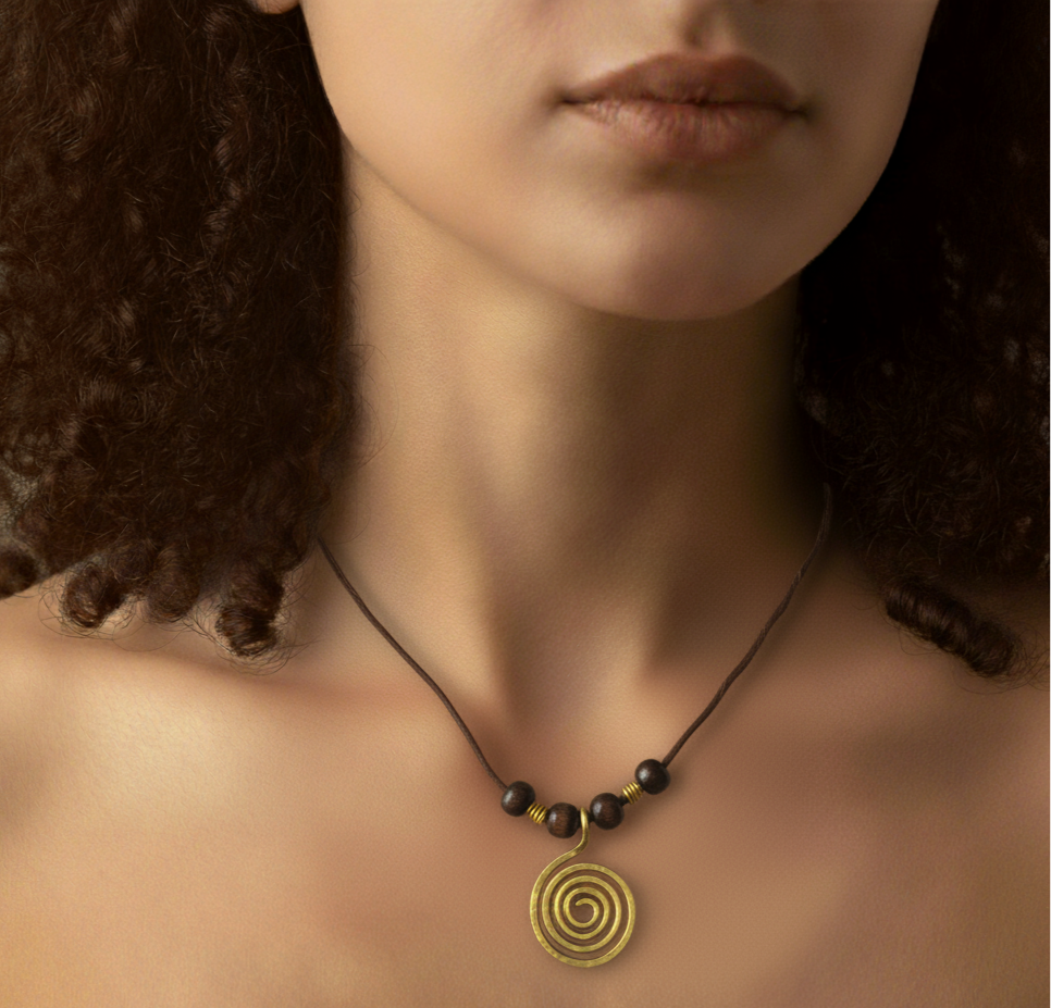 Necklace with a spiral pendant worn by a person