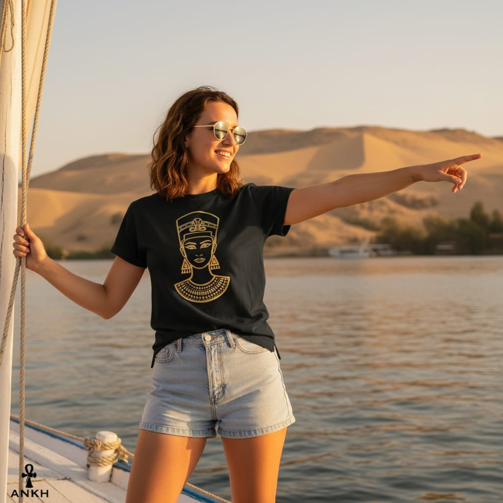 Woman on a boat pointing towards a scenic landscape with mountains and water.