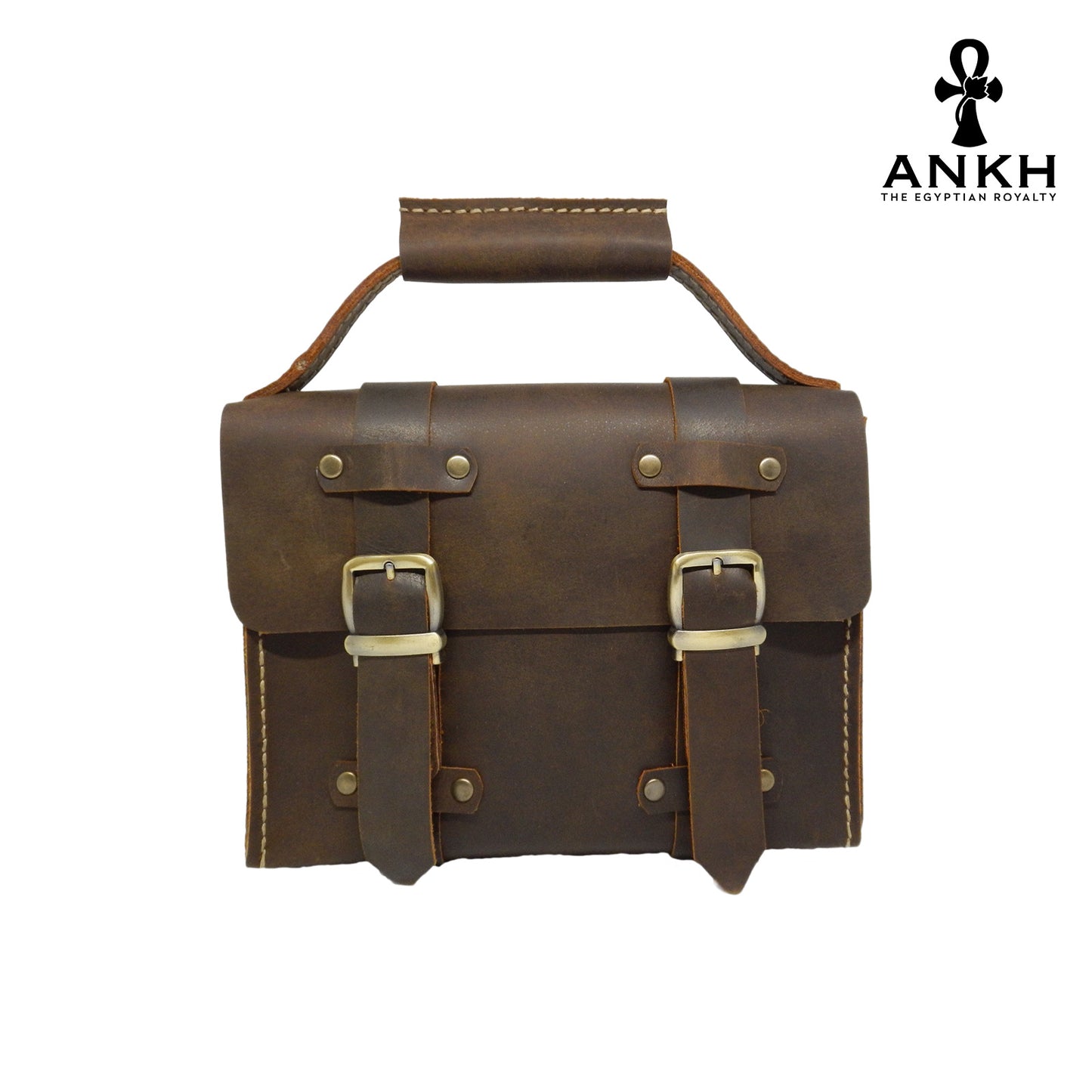 A genuine leather cross bag with handcrafted brass accessories and multiple pockets, displayed on a white background with a black logo of ANKH - The Egyptian Royalty.