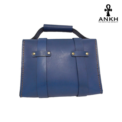 A genuine leather cross bag with handcrafted brass accessories and multiple pockets, displayed on a white background with a black logo of ANKH - The Egyptian Royalty.