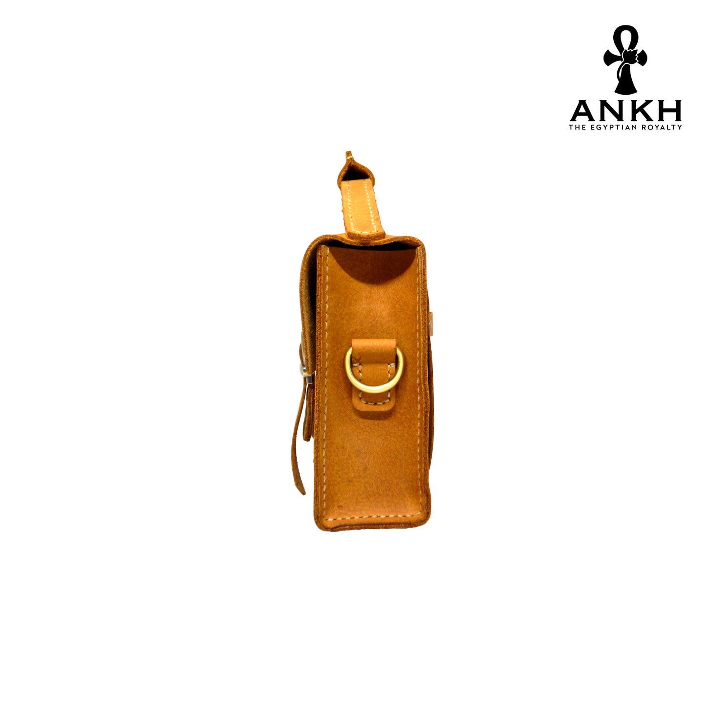 A genuine leather cross bag with handcrafted brass accessories and multiple pockets, displayed on a white background with a black logo of ANKH - The Egyptian Royalty.