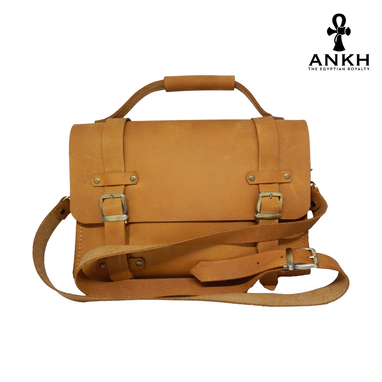 A genuine leather cross bag with handcrafted brass accessories and multiple pockets, displayed on a white background with a black logo of ANKH - The Egyptian Royalty.