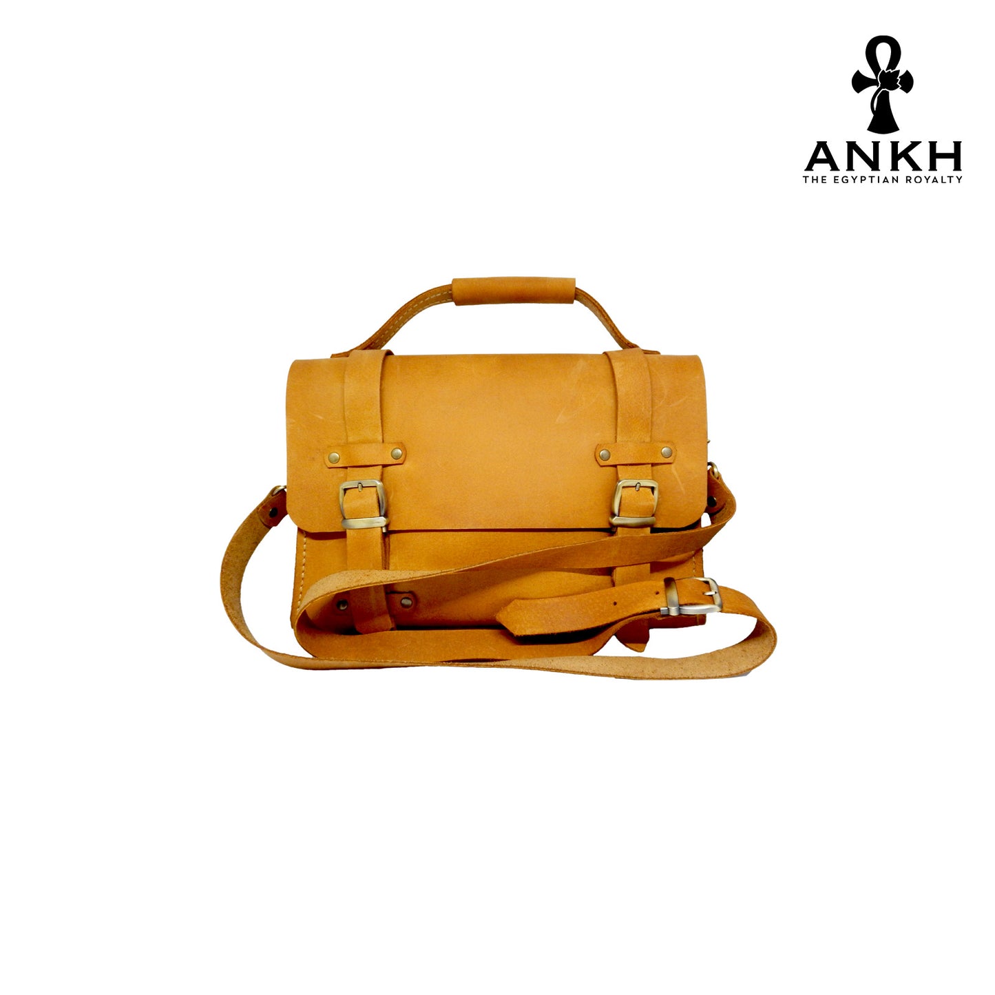 A genuine leather cross bag with handcrafted brass accessories and multiple pockets, displayed on a white background with a black logo of ANKH - The Egyptian Royalty.