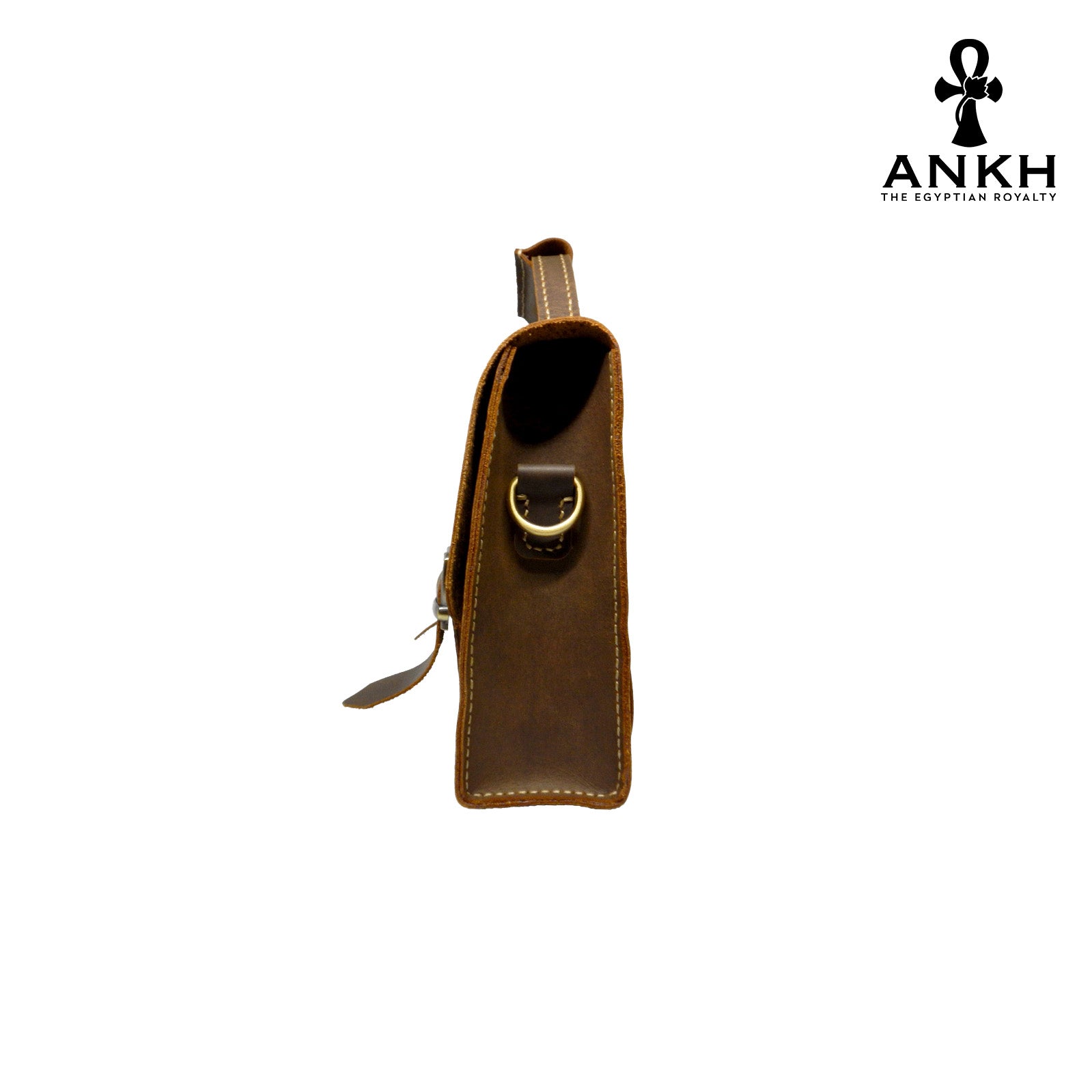 A genuine leather cross bag with handcrafted brass accessories and multiple pockets, displayed on a white background with a black logo of ANKH - The Egyptian Royalty.