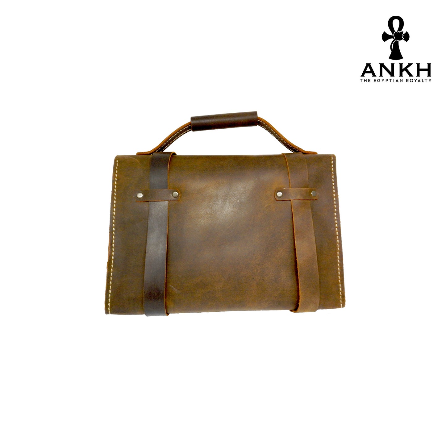 A genuine leather cross bag with handcrafted brass accessories and multiple pockets, displayed on a white background with a black logo of ANKH - The Egyptian Royalty.