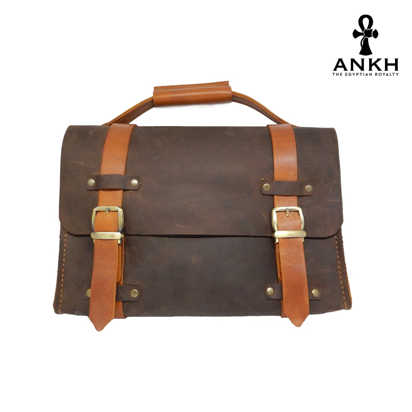 A genuine leather cross bag with handcrafted brass accessories and multiple pockets, displayed on a white background with a black logo of ANKH - The Egyptian Royalty.