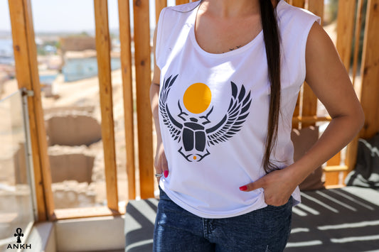 A woman wearing a sleeveless t-shirt featuring an ancient Egyptian Scarab print, made from soft 100% Egyptian cotton