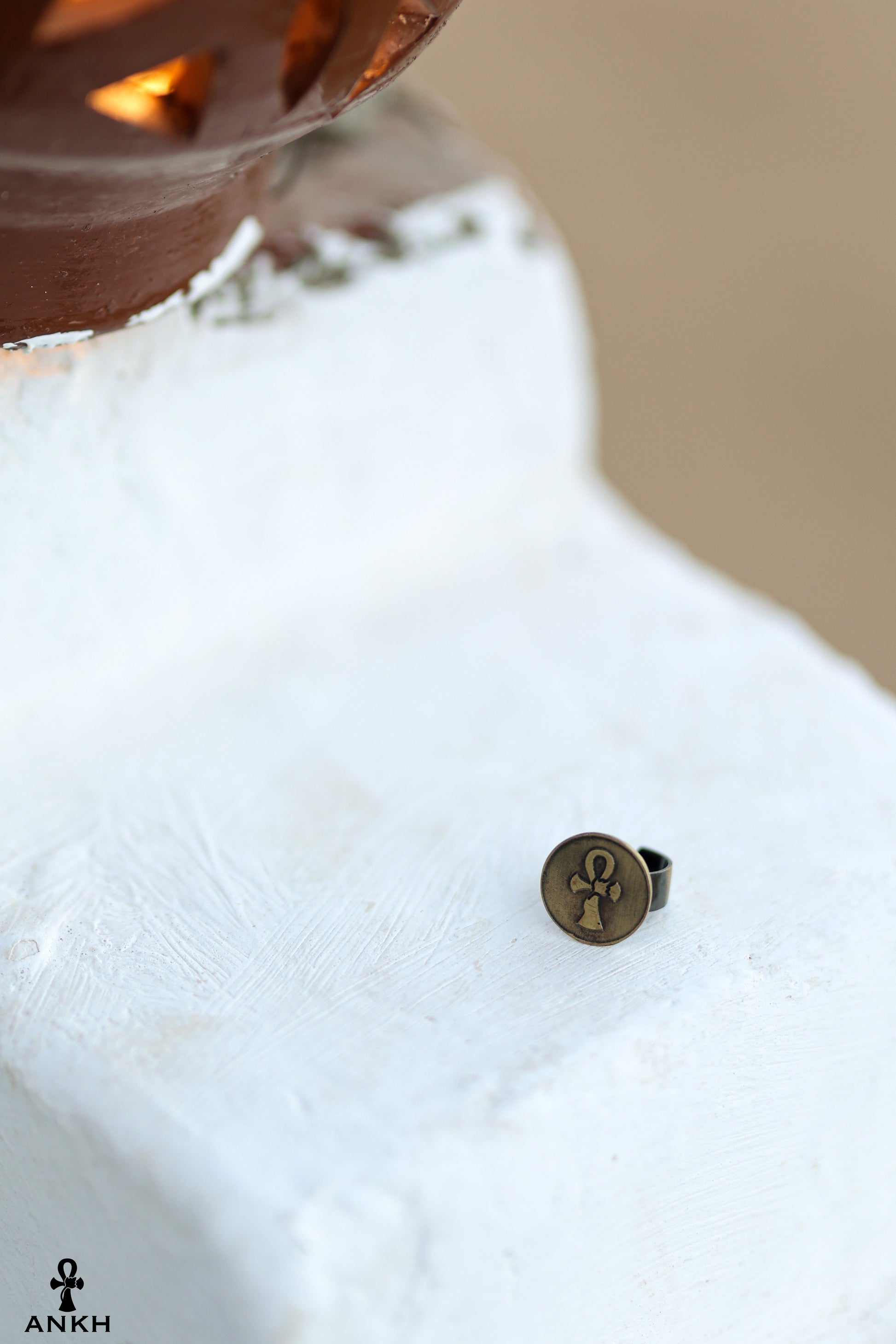 copper ring engraved with the Ankh symbol, ancient Egyptian emblem of life, eternity, and divine union. Adds timeless elegance and potent symbolism to any outfit