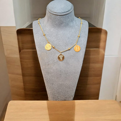 Gold-Plated Egyptian Symbol Necklace with Lotus, Horus, and Maat Pendants