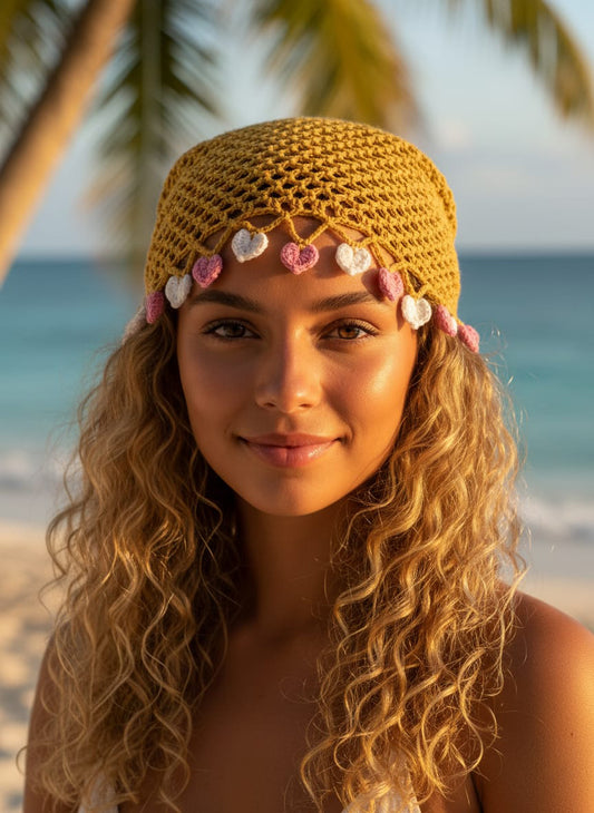 Woman wearing a crochet headband with flowers on a beach
