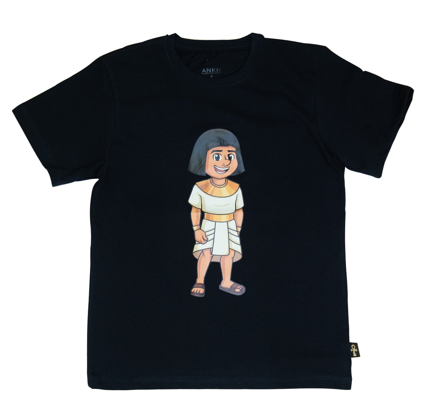 A child wearing a black T-shirt adorned with a playful illustration of Sinuhe, an iconic Egyptian boy character - an epitome of luxury and cultural richness