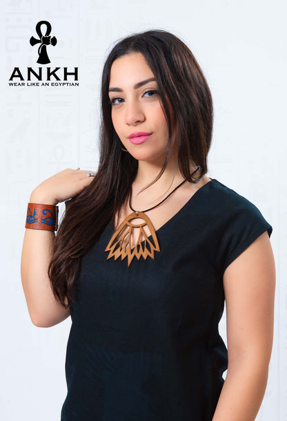 ANKH’s exclusive dress, intricately designed for the modern Egyptian culture enthusiast. Adorned with a unique, upper-class necklace, this piece is a must-have for tourists seeking an authentic Egyptian aesthetic