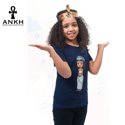 A child wearing Ankh’s navy blue t-shirt adorned with ‘Anippe’, a cartoony Egyptian girl character printed on premium quality 100% Egyptian cotton - perfect attire reflecting ancient Egyptian culture