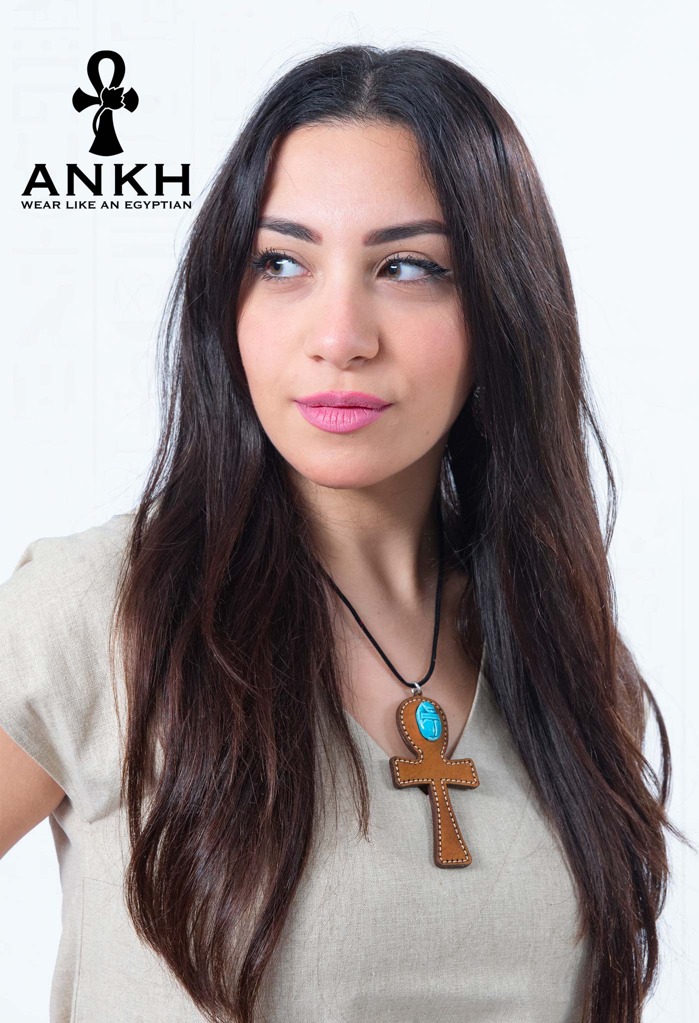 ANKH’s exclusive dress, intricately designed for the modern Egyptian culture enthusiast. Adorned with a unique, upper-class necklace, this piece is a must-have for tourists seeking an authentic Egyptian aesthetic