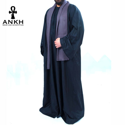 Man wearing Ankh’s Traditional Men Gallabiya, a timeless classic of Egyptian origin, perfect for any formal occasion