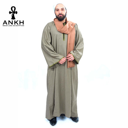 Man wearing Ankh’s Traditional Men Gallabiya, a timeless classic of Egyptian origin, perfect for any formal occasion