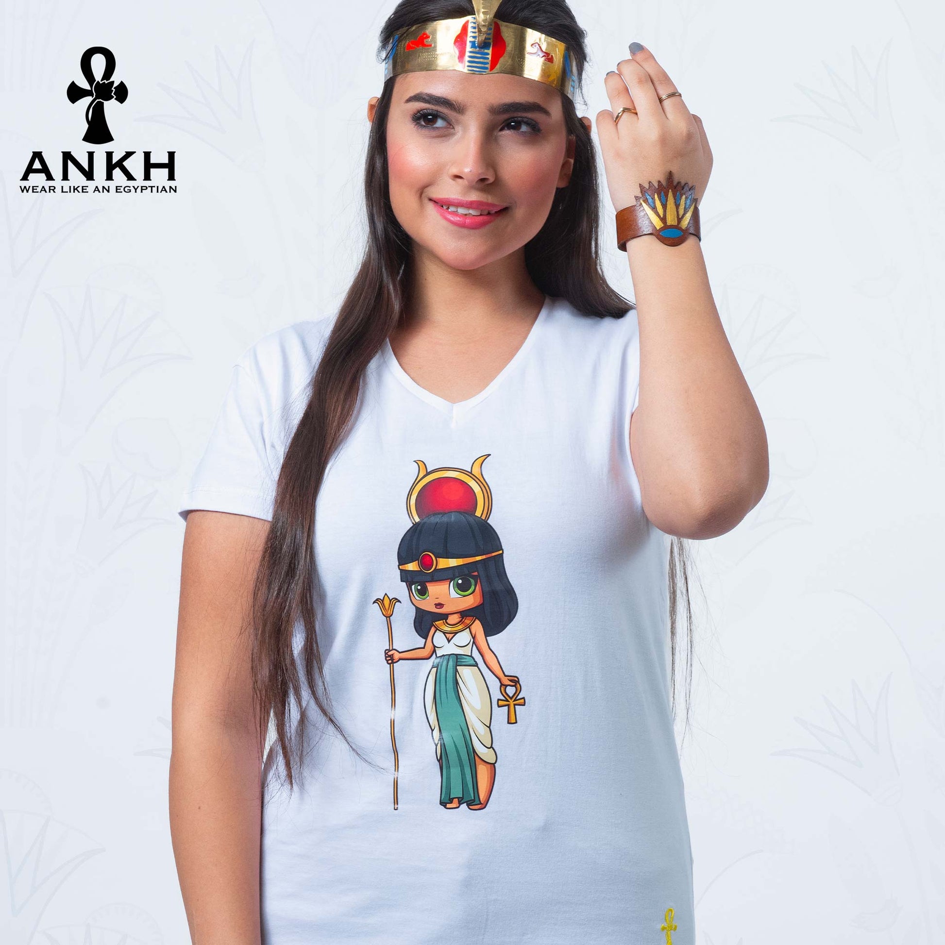 Elegant woman wearing Ankh’s exclusive T-shirt adorned with a vibrant print featuring iconic Egyptian Goddess Queen ‘Isis’, crafted from luxurious 100% Egyptian Cotton